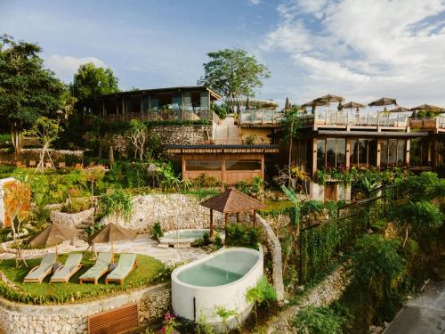 Bridge Portal venue in Bali — terraced gardens, pool, and eco-luxury architecture